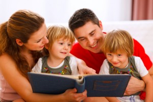 cute kids checking their family photo allbums